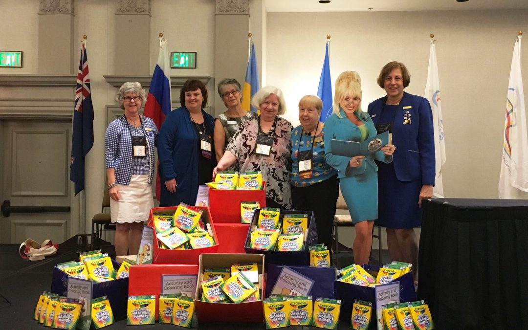 Altrusa International Colors GBBF Happy with Crayola Markers Donation